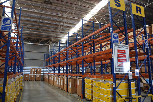 warehouse interior showing various racking systems