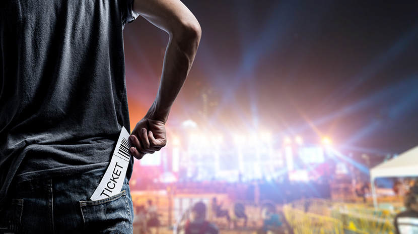 customer-with-festival-ticket-in-pocket