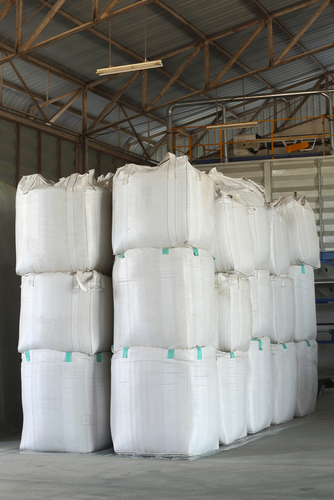 super-sack-bags-stacked-vertically-in-warehouse