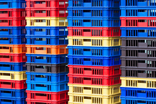 bright plastic containers in piles