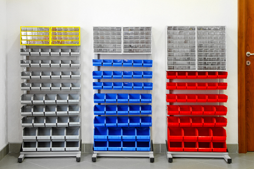 Colorful plastic shelves organizer in work shop