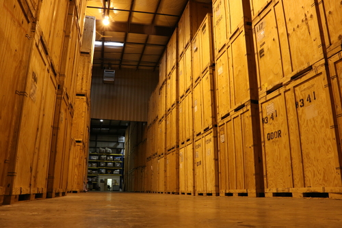 large hall of wooden crates