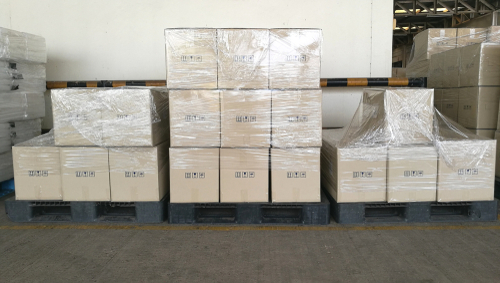 shipping boxes wrapped in plastic