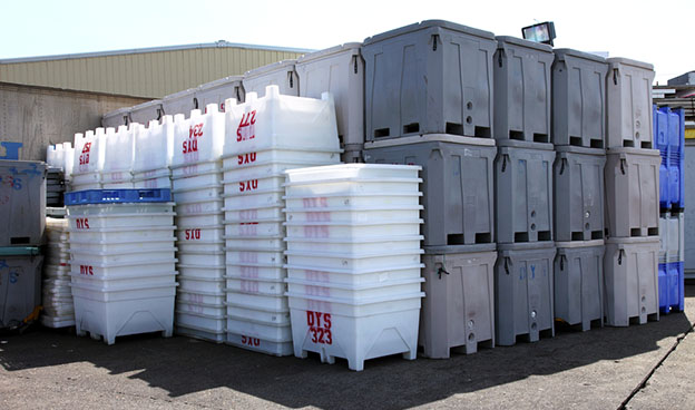 large plastic totes stacked