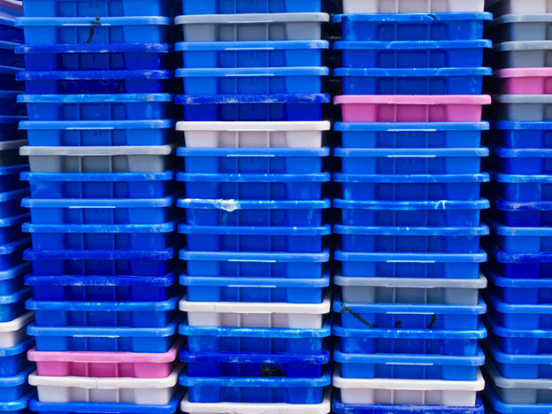 stacks of empty colorful plastic containers