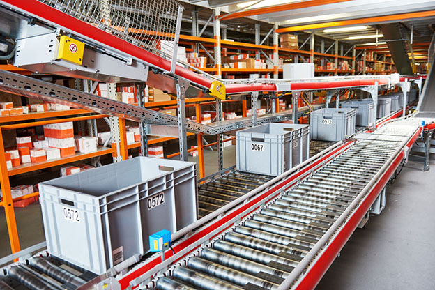 warehouse containers on conveyer belt
