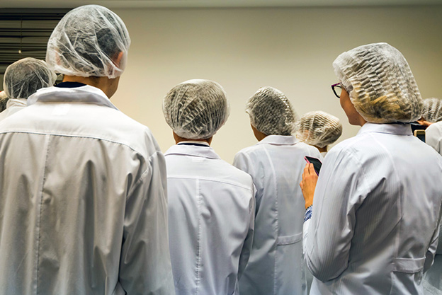 Food factory workers in uniform