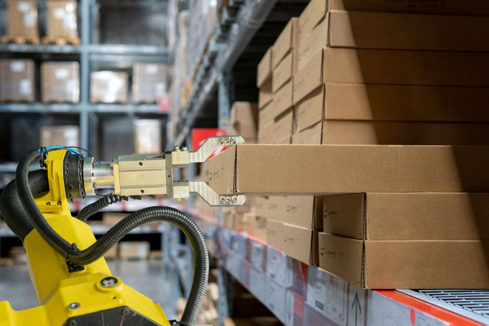 robot removing box warehouse shelves