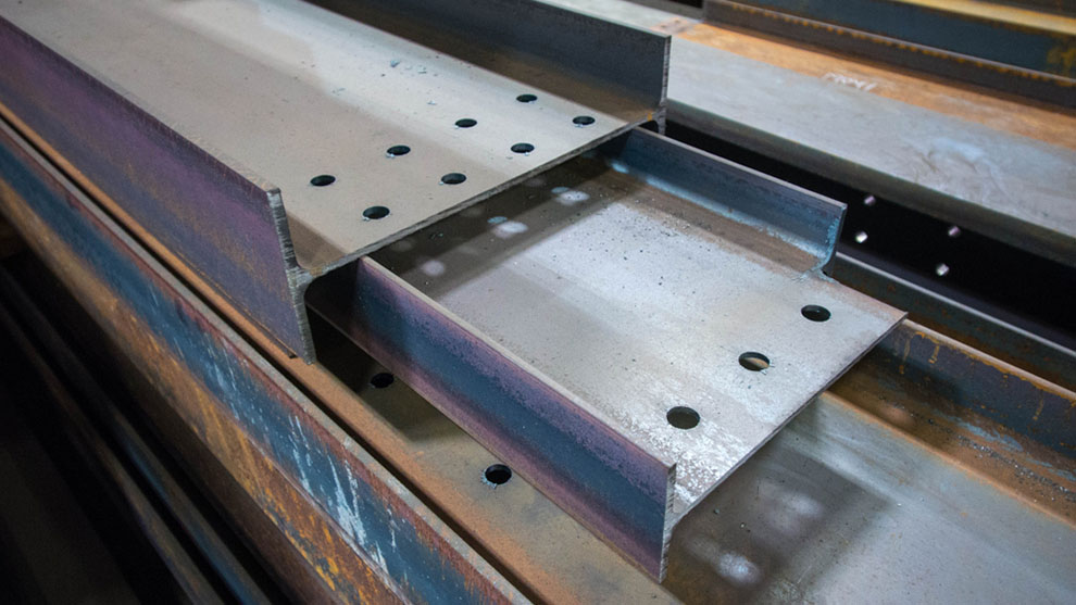 Assortment steel profiles in steel fabrication shop