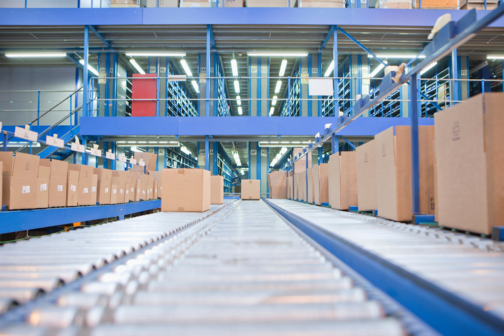 a head on view of boxes on a conveyor