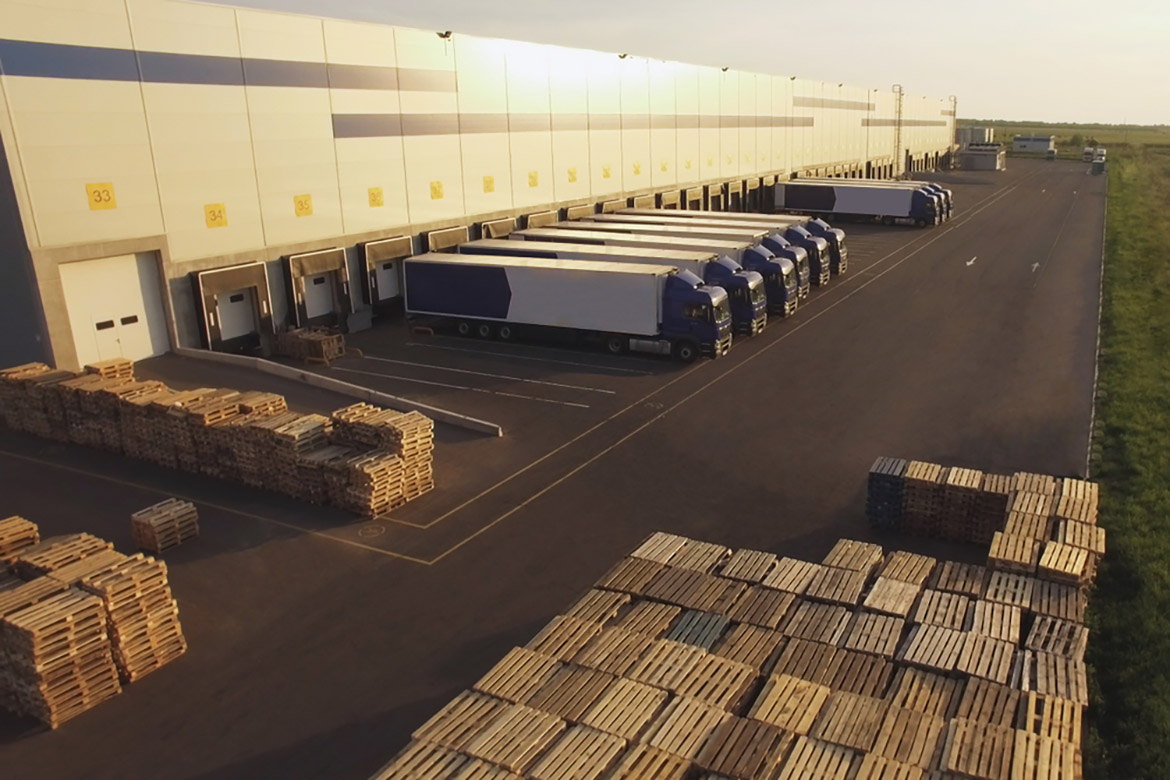distribution warehouse with trucks
