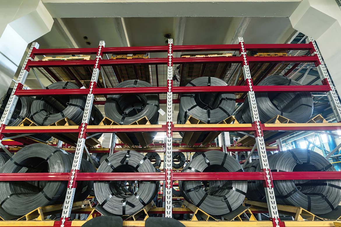 metal rolls on stack racks